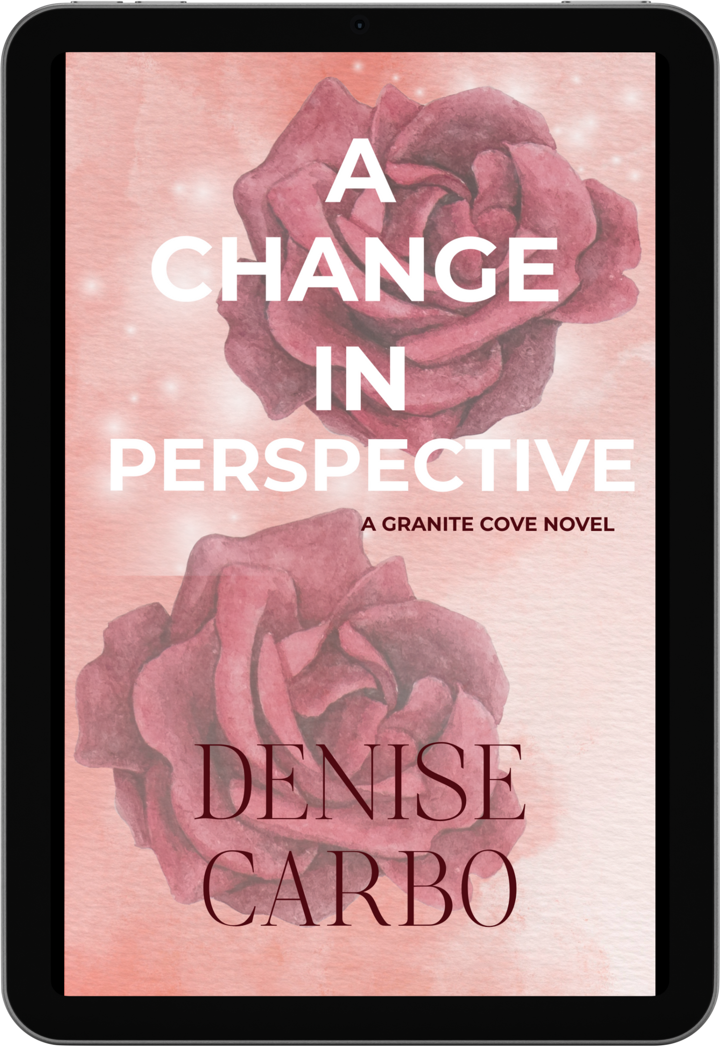 Book cover of 'A Change in Perspective' by Denise Carbo with roses on a pink background. smalltown romance