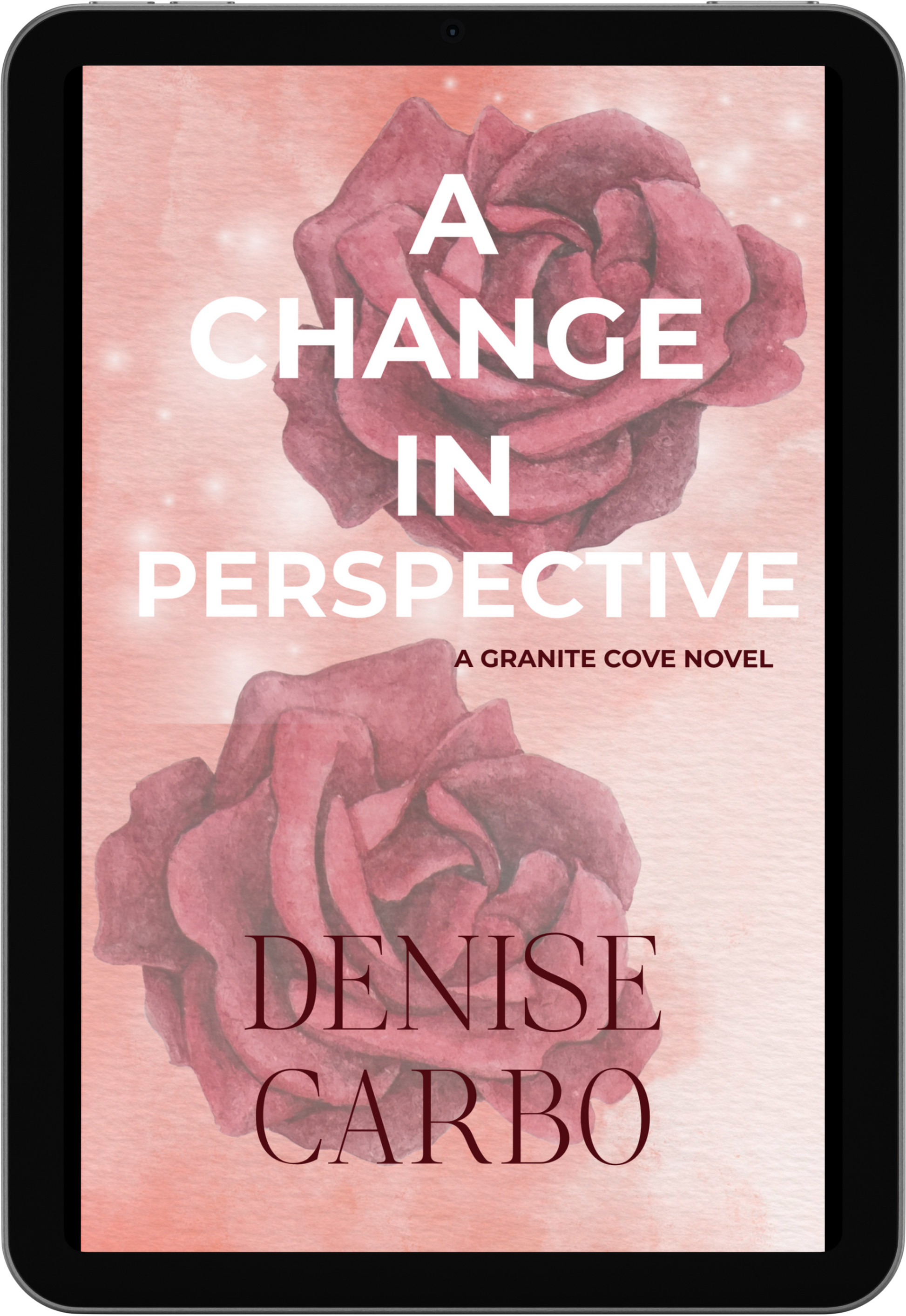 Book cover of 'A Change in Perspective' by Denise Carbo with roses on a pink background. smalltown romance